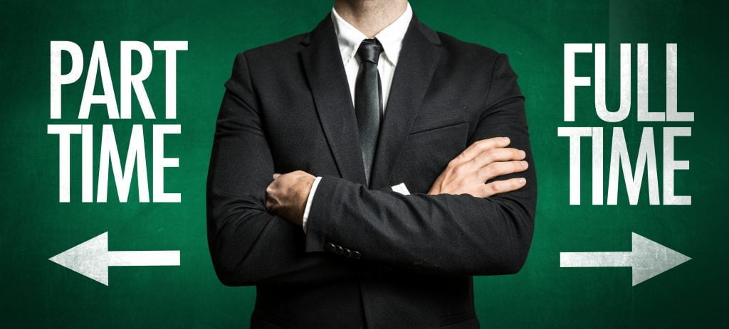 Man in black suit in middle of the photo with a part time arrow pointing to his left side and a full-time arrow pointing to this right side. Colors are green, black, and white