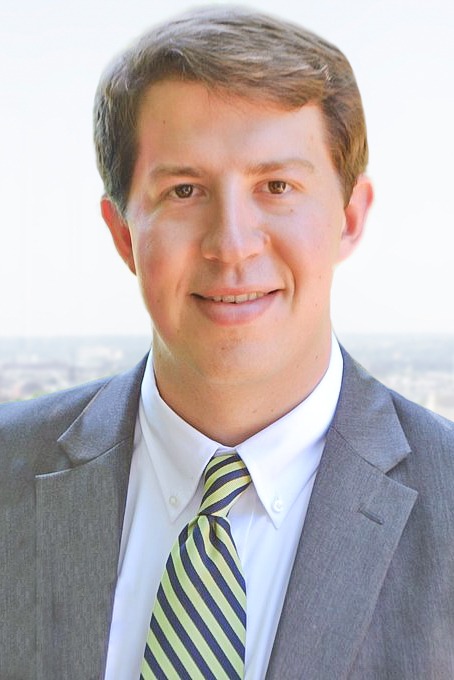 Professional headshot of attorney Gregory Adair