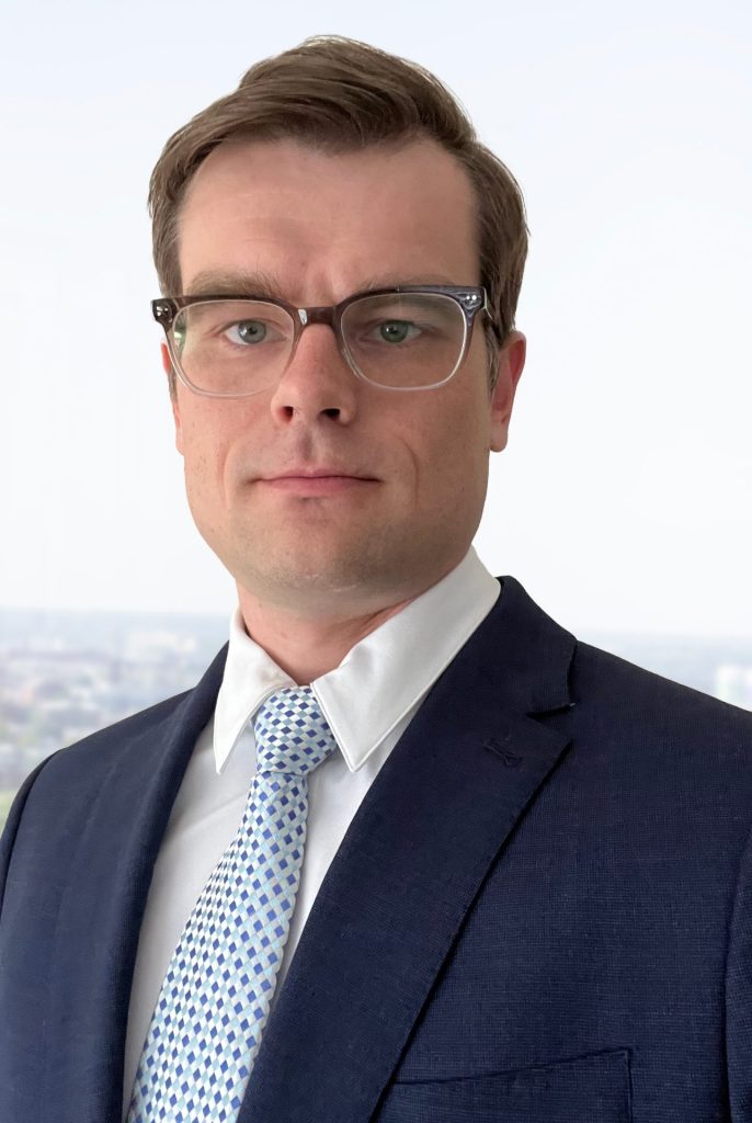 Professional headshot of Attorney Maxim Doroshenko