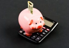 piggy bank with calculator.
