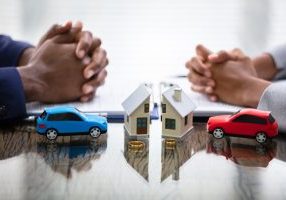 Wife And Husband Splitting House And Car During Divorce Process