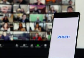 Smartphone showing Zoom Cloud Meetings app,