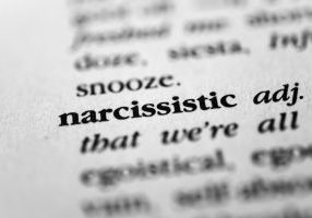 close-up of the word narcissistic in the dictionary