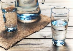 Glasses,Of,Water,On,A,Wooden,Table.,Selective,Focus.,Shallow