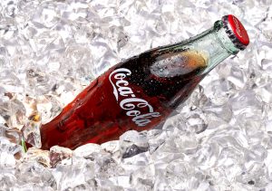 250ml Classic Coca-Cola bottle with ice.