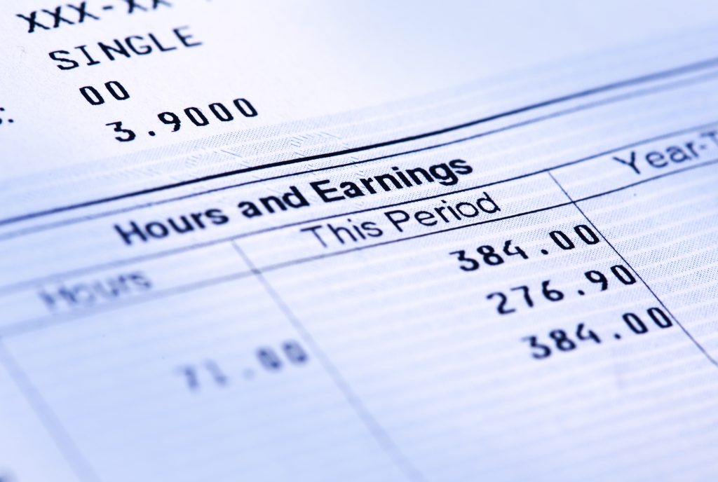 close up of an earnings statement