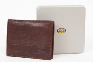 Melbourne,Australia-June,29,2015:Fossil leather wallet closeup. Fossil Group, Inc. is an American designer and manufacturer of clothing and accessories
